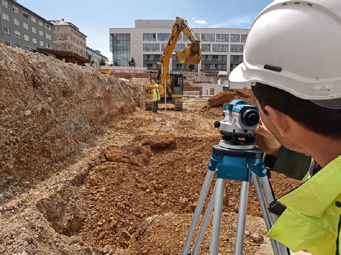 Surveyor at a construction site