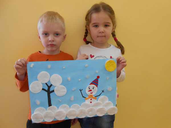 Boy and girl holding snowman applique