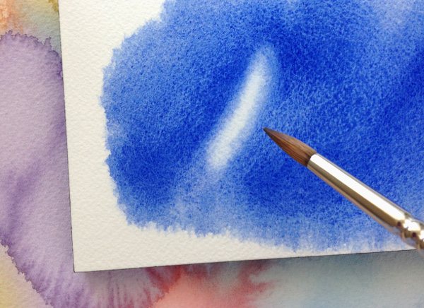 Lifting paint from the surface of watercolor paper