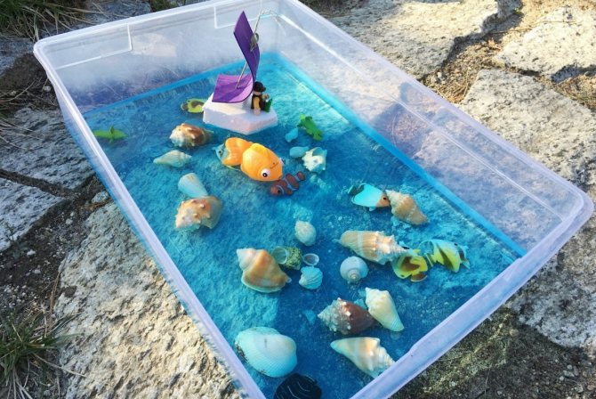 Sensory boxes filled with water